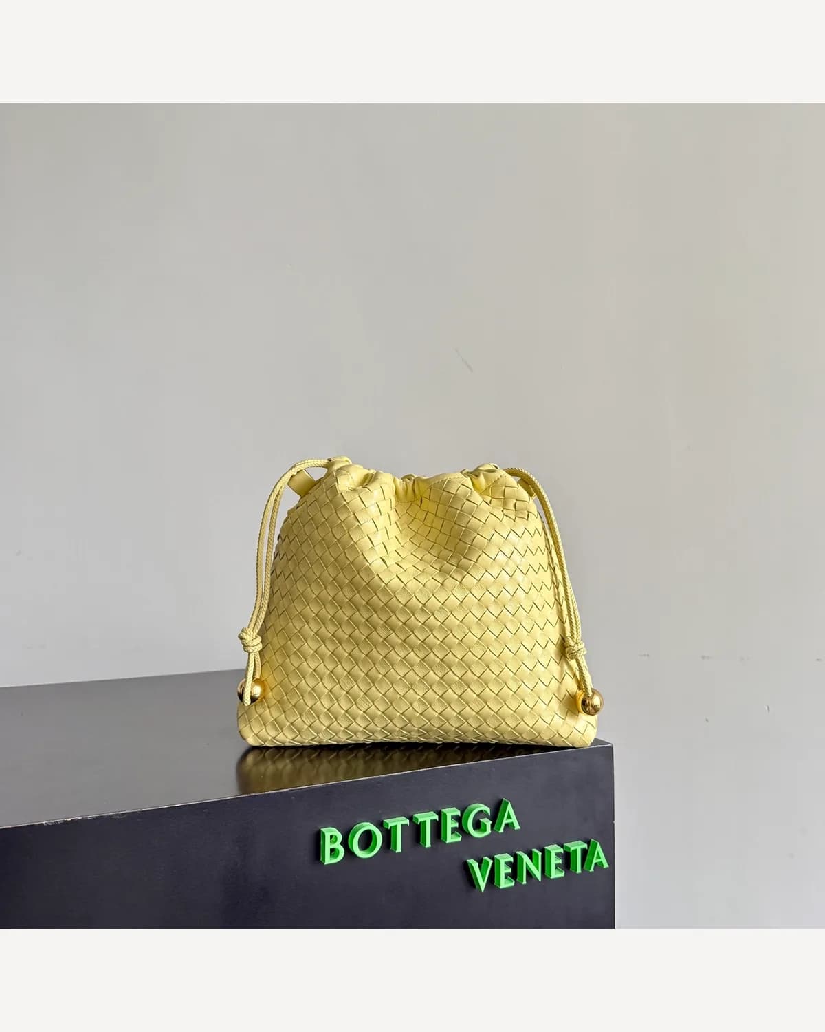 Bottega Veneta Woven Drawstring Bag — Yellow
