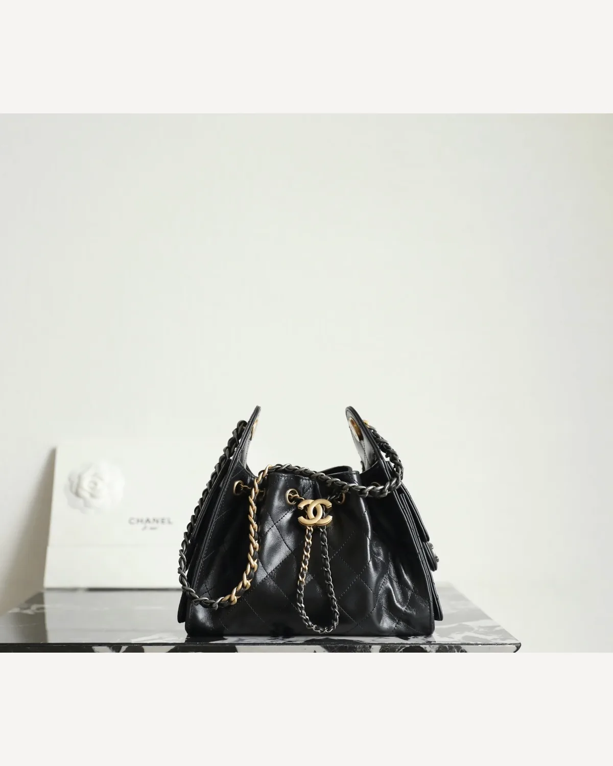 Chanel Drawstring Bucket Bag — Black Leather