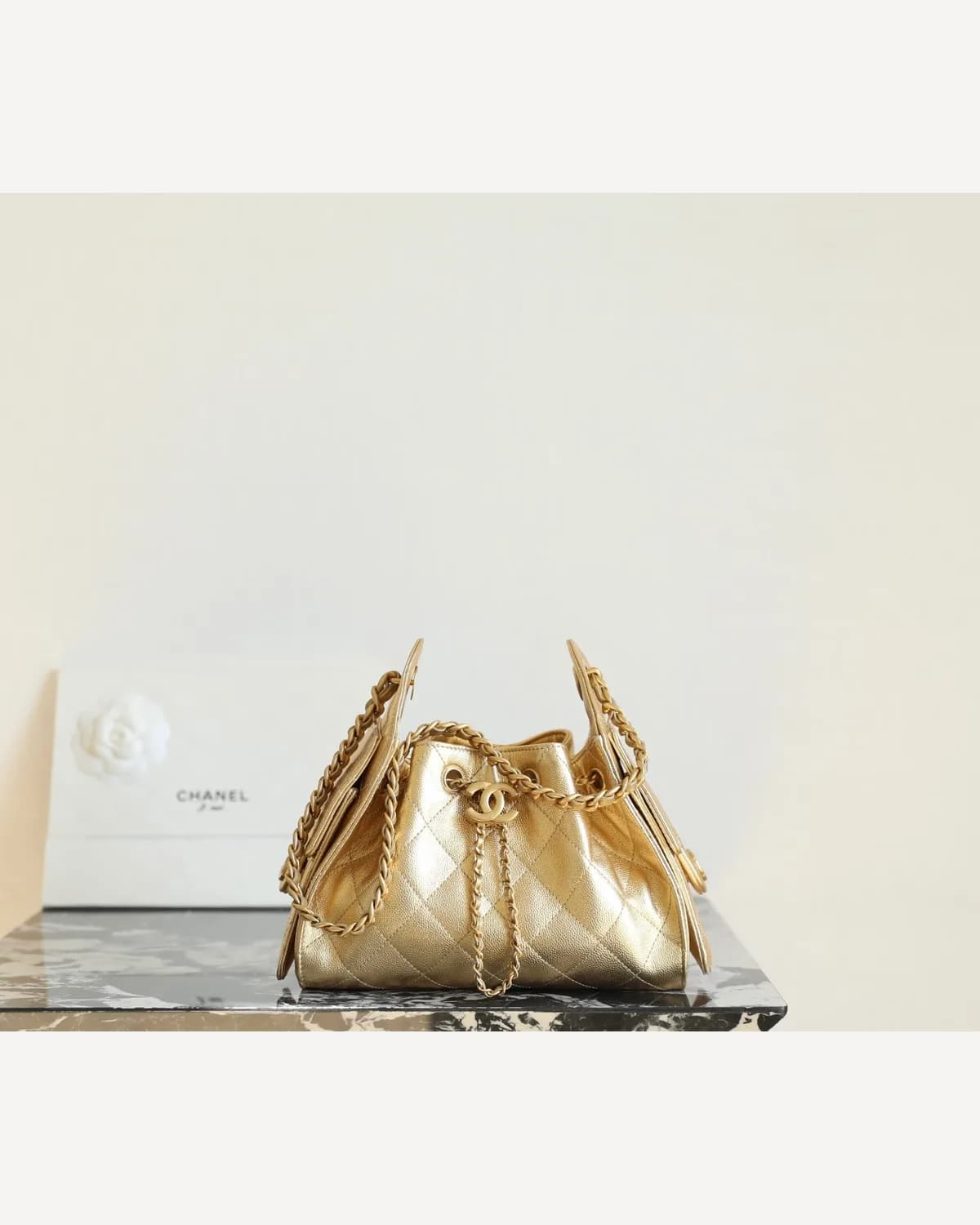 Chanel Drawstring Bucket Bag — Gold