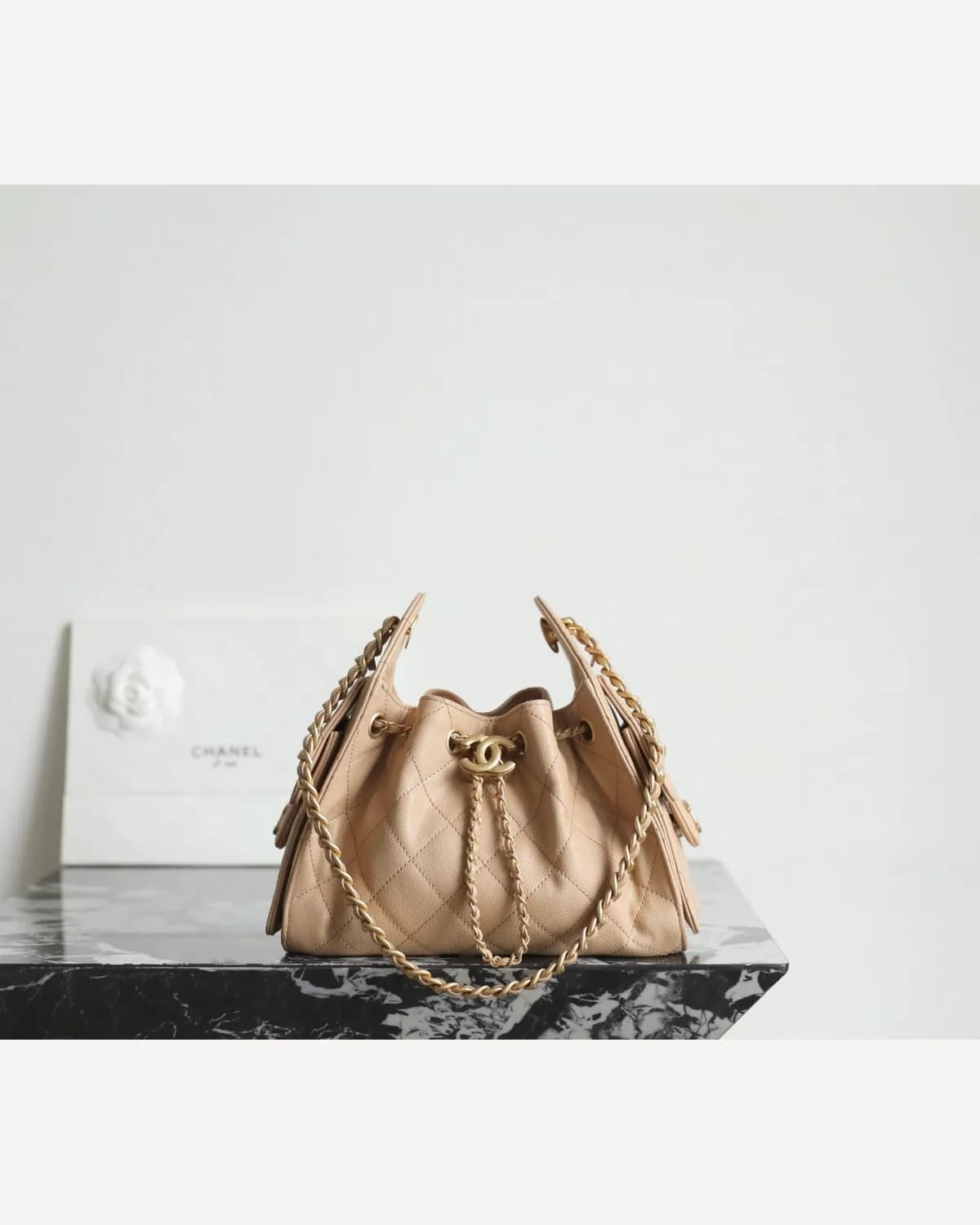 Chanel Drawstring Bucket Bag — Beige