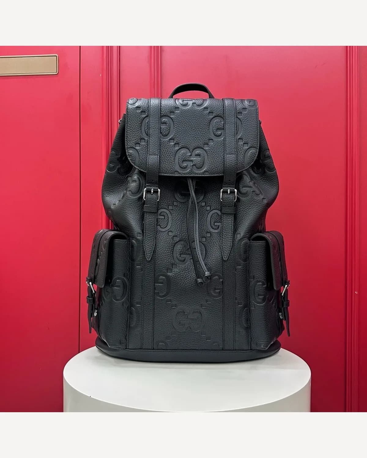 Gucci GG Embossed Leather Backpack — Black