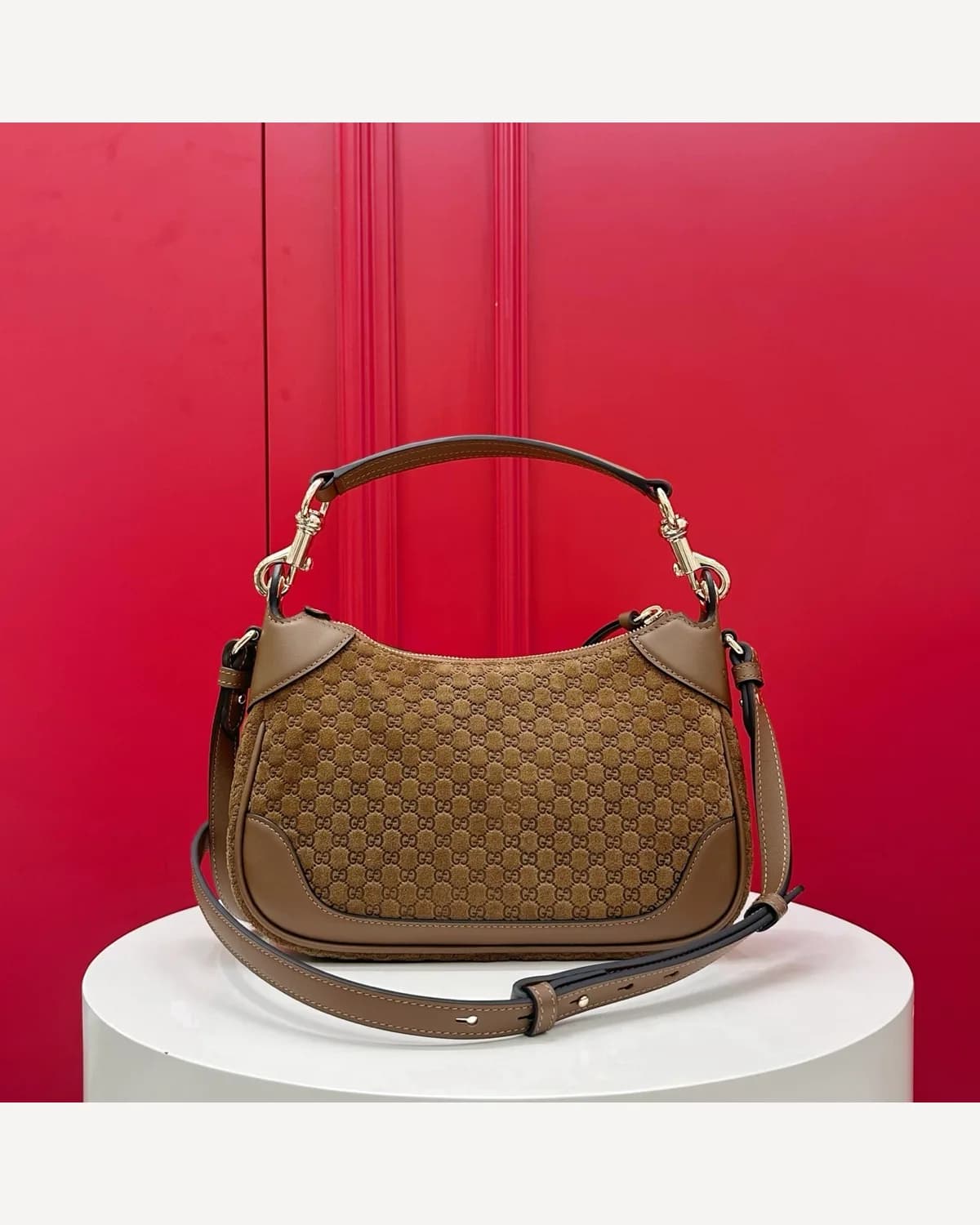 Gucci GG Embossed Hobo — Tan