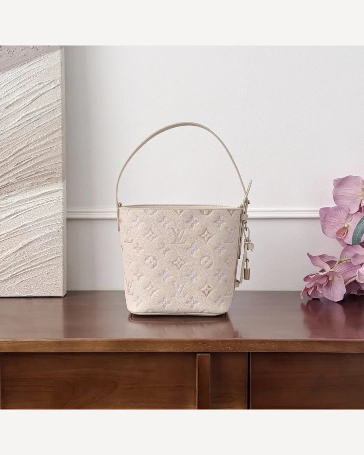 Louis Vuitton Bucket — Cream Embossed